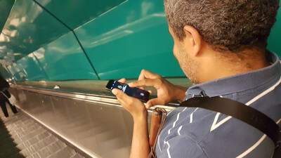 A blind man uses the app Evelity to get around in the subway