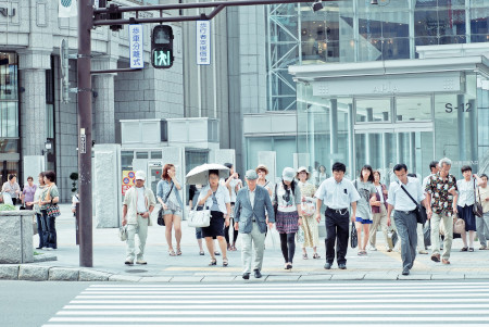Pedestrians crossing the street in Japan