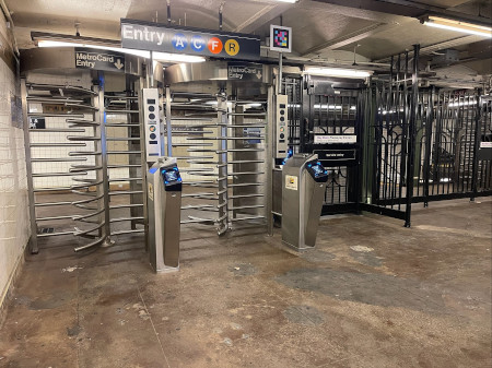 new-york-city-subway-station The entrance of the JaySt-MetroTech subway station in New York City with turnstiles