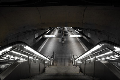 A long stair with escalators on both sides in a subway station